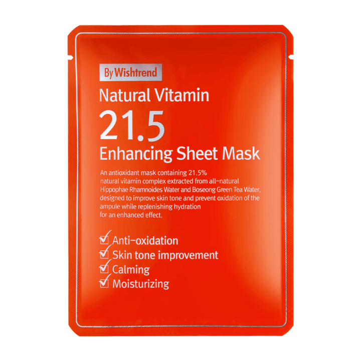 By Wishtrend Natural Vitamin 21.5% Enhancing Sheet Mask i en röd förpackning med vit text, som framhäver dess antioxidativa och återfuktande egenskaper.